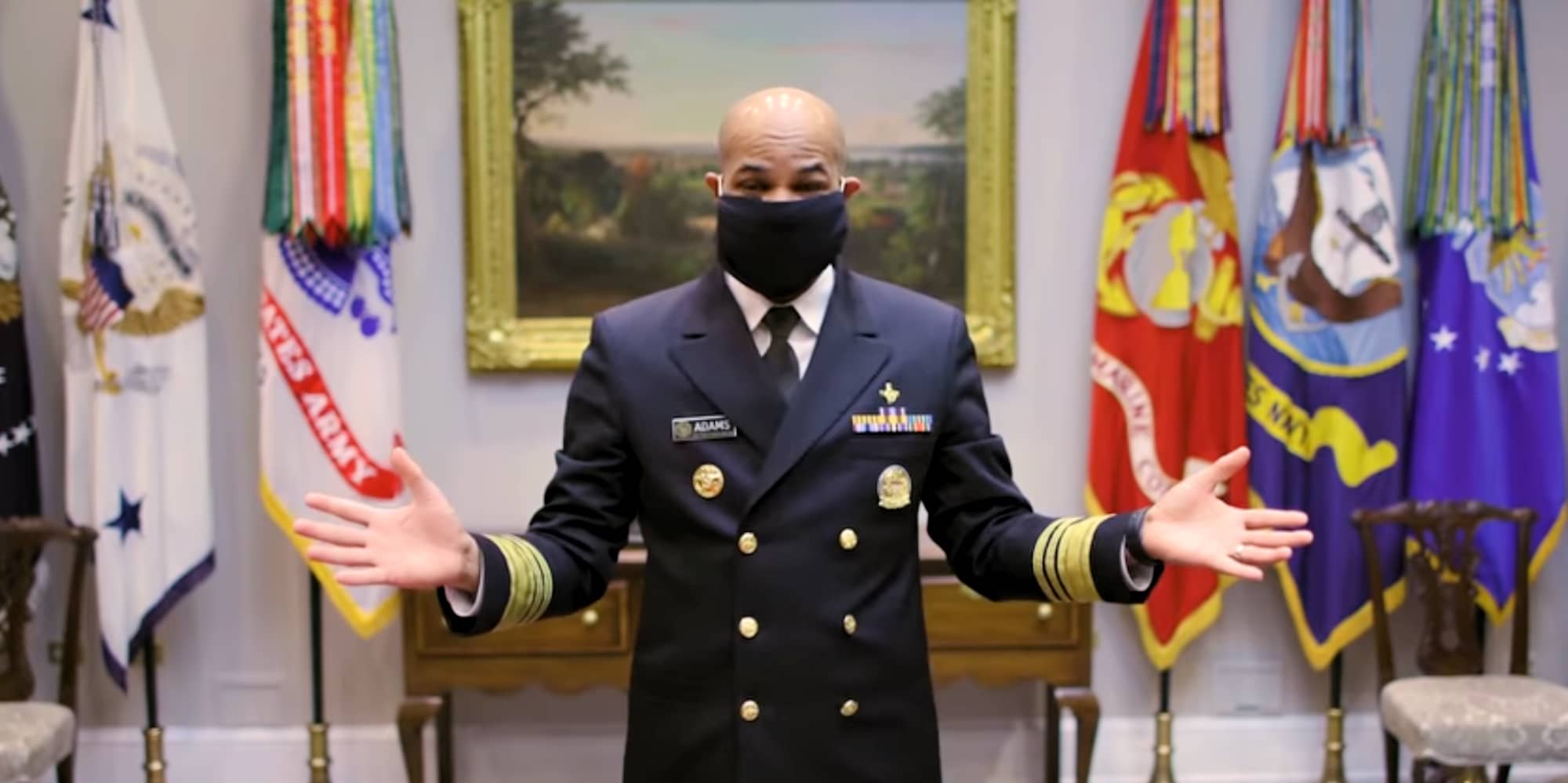 US Surgeon General Jerome Adams demonstrates a face mask made in less than a minute from an old t-shirt and two rubber bands (Centres for Disease Control and Prevention)