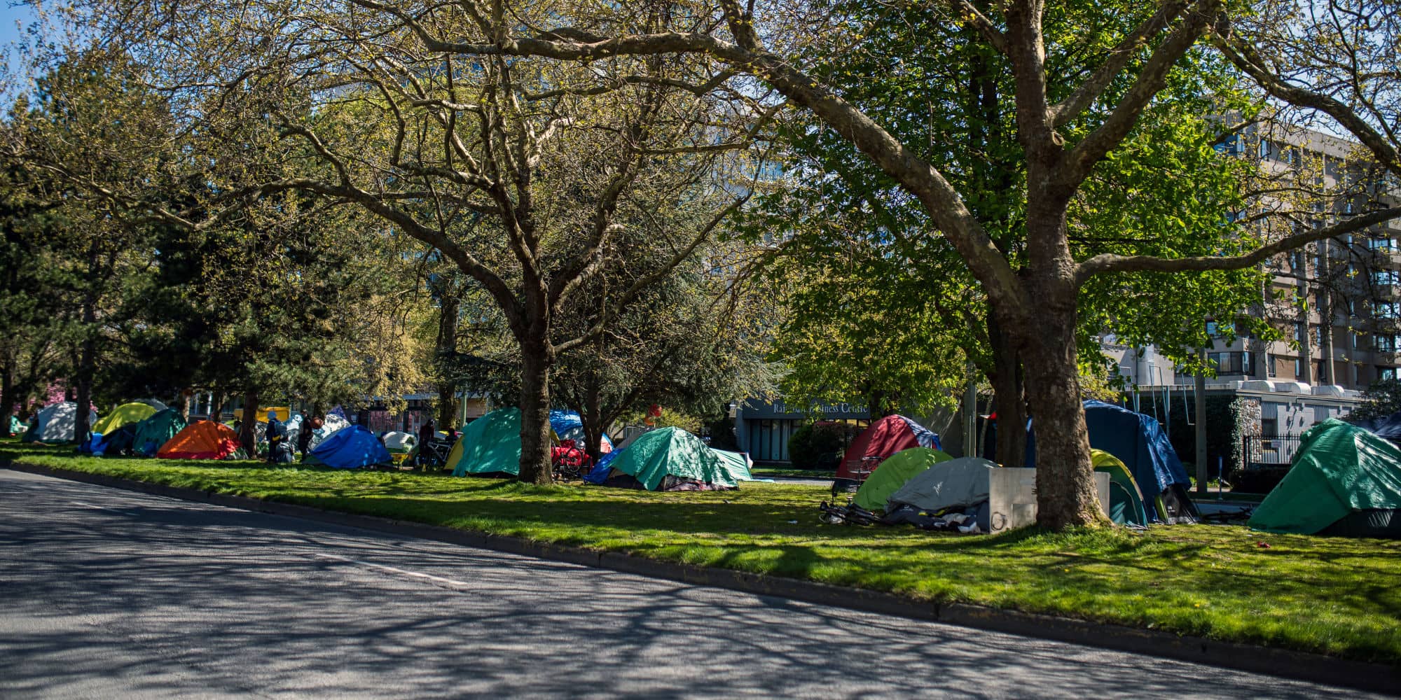 Tents pitched along Pandora Avenue in the early days of the pandemic (James MacDonald for Capital Daily).