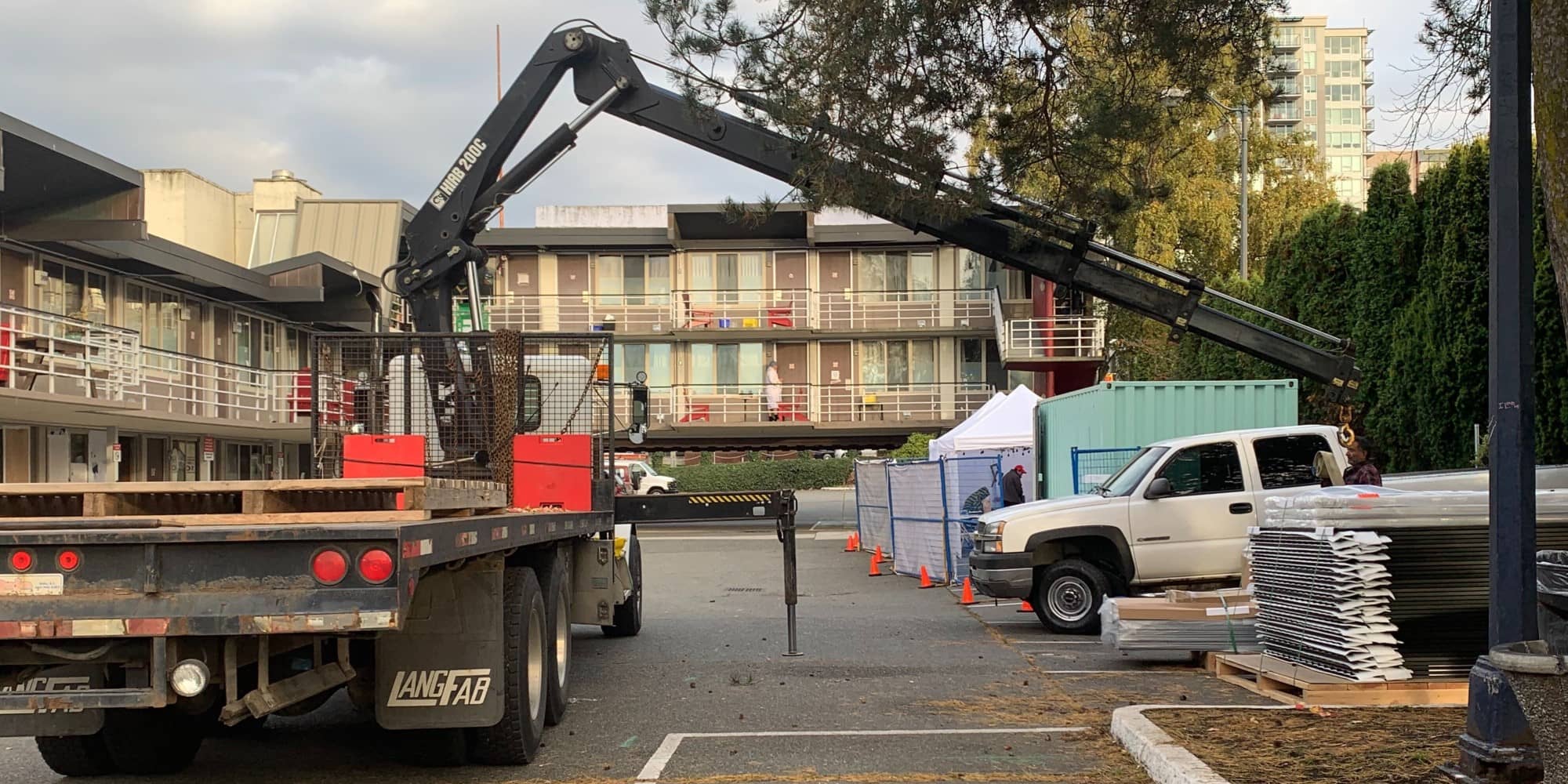 October 26th photo by Anna J. James showing the installation of fencing at the former Paul's Motor Inn in a reported effort to curb criminal activity at the site.
