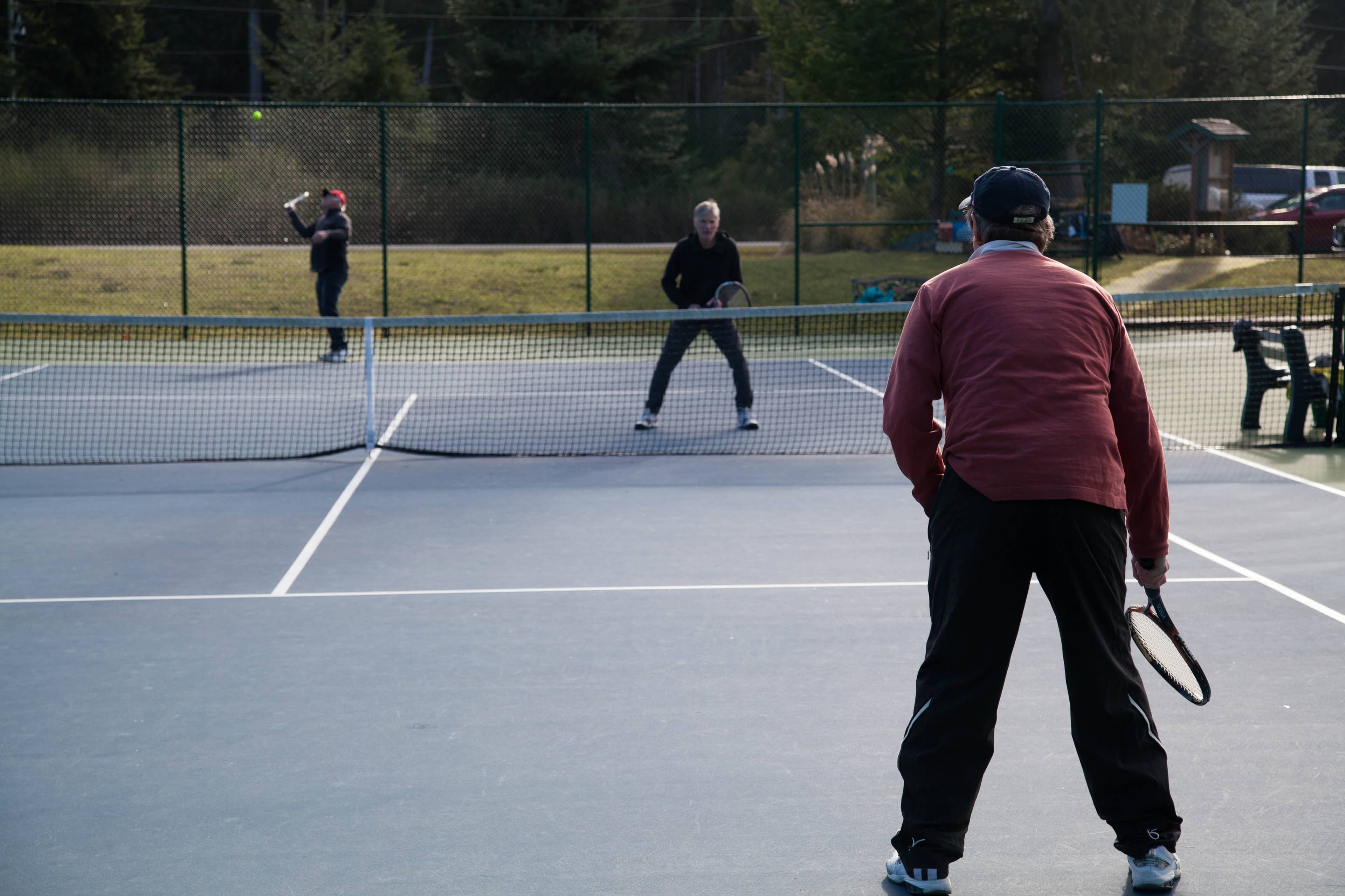 Pickleball players and tennis players have been squaring off on Mayne Island over use of the courts. Photo: Justine Apostolopoulos / Capital Daily
