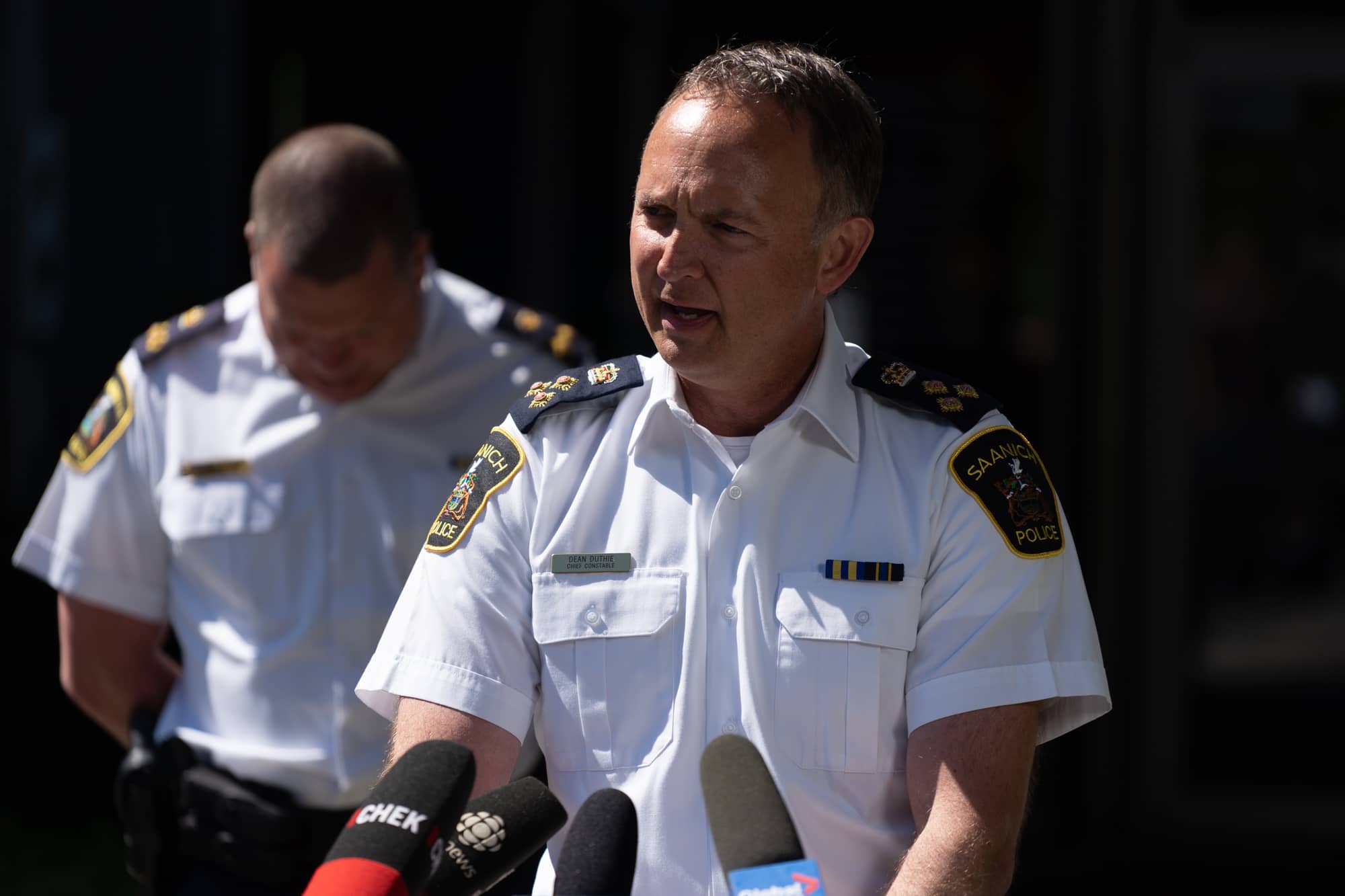 Neighbours report new shelter-in-place order, one person in custody, as Saanich bank robbery investigation continues