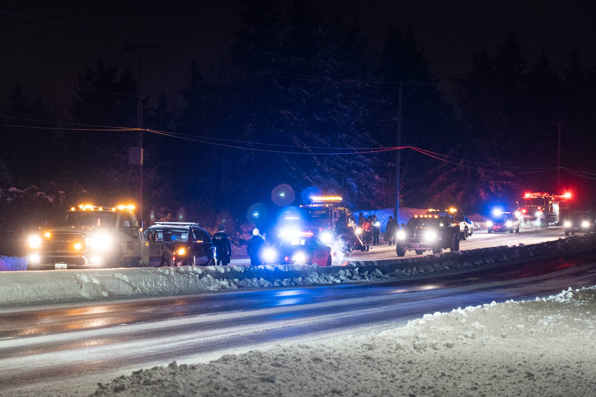 First responders deal with an accident on the Patricia Bay Highway in slippery conditions Tuesday evening. Jimmy Thomson / Capital Daily