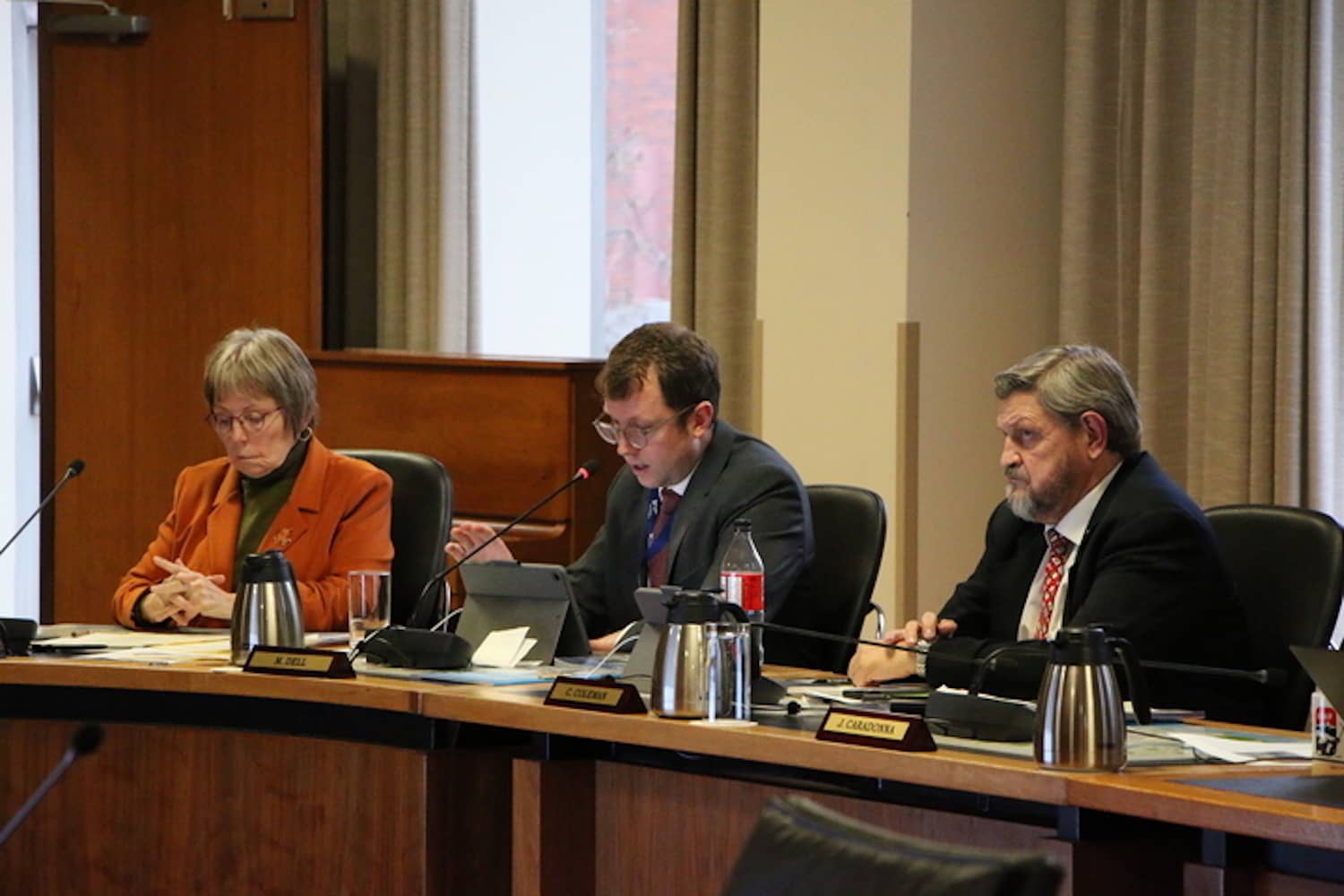 Victoria Couns. Marg Gardiner, Matt Dell and Chris Coleman during final debate on the Missing Middle housing policy. Photo : Shannon Waters / Capital Daily