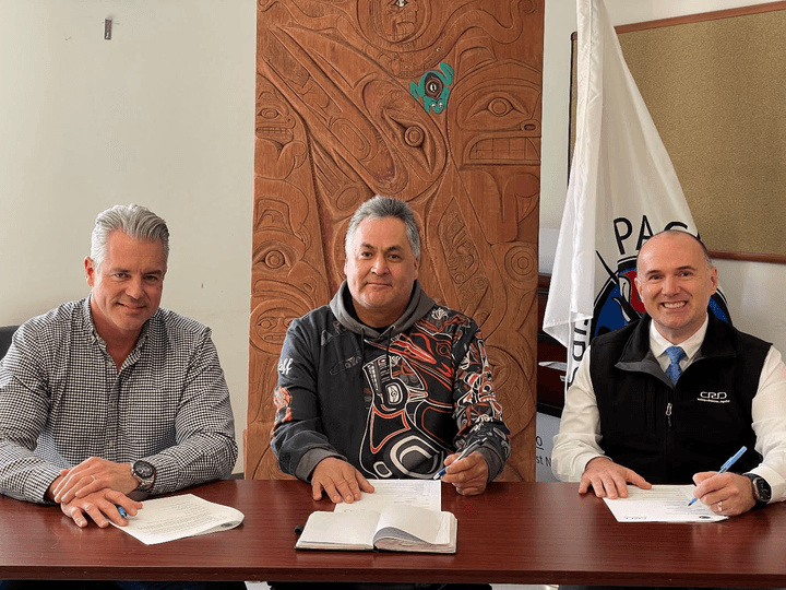 CRD CAO Ted Robbins, paaʔčiidʔatx̣ (Pacheedaht) First Nation elected Chief Jeff Jones and CRD Board Chair Colin Plant sign Memorandum of Understanding. Photo: Courtesy CRD/Pacheedaht First Nation