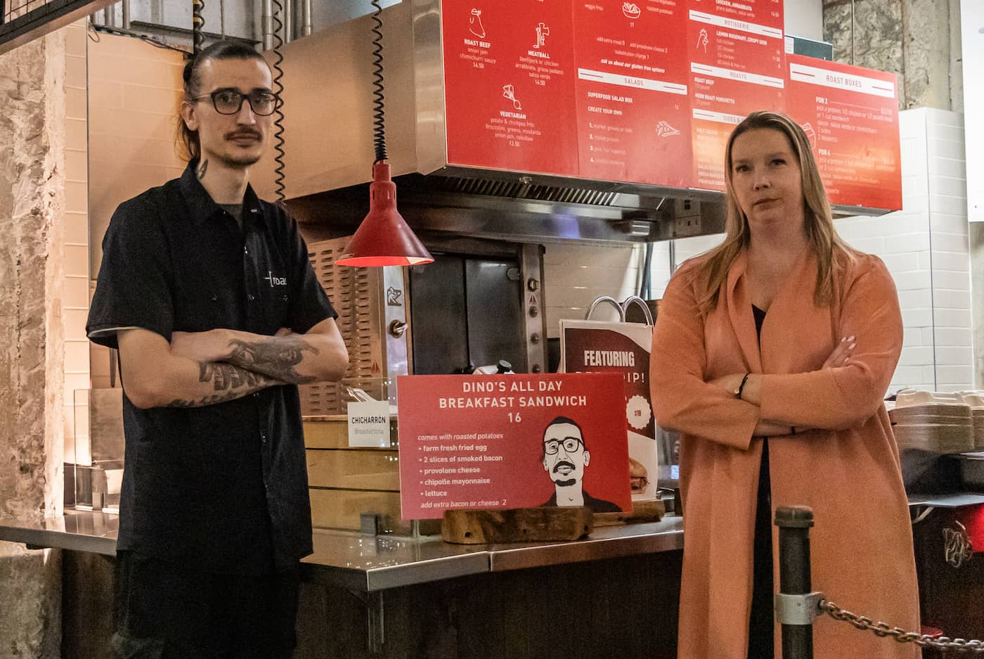 Dino Osmanovic and Maryanne Carmack in front of Roast's counter. Photo: Robyn Bell / Capital Daily