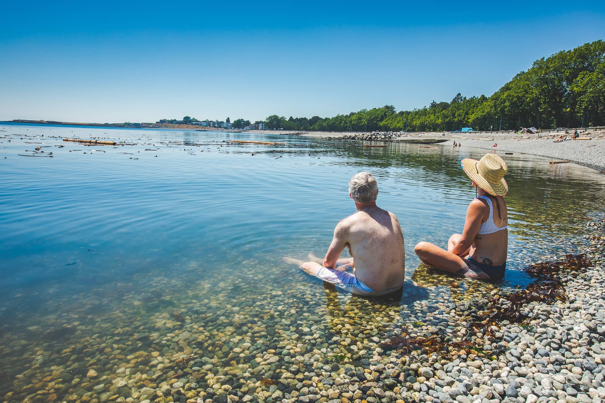 People cool off in the ocean during Victoria’s record-breaking heatwave in 2021. Photo: Colin Smith / Capital Daily