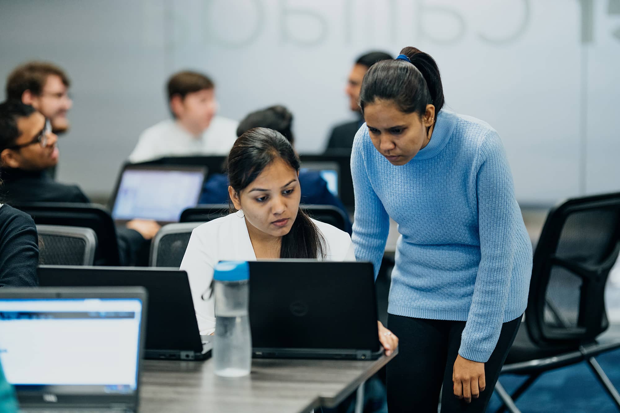 Students at a former NPower Canada Calgary class learn in-person prior to the pandemic. Photo: Matthew J. Keay