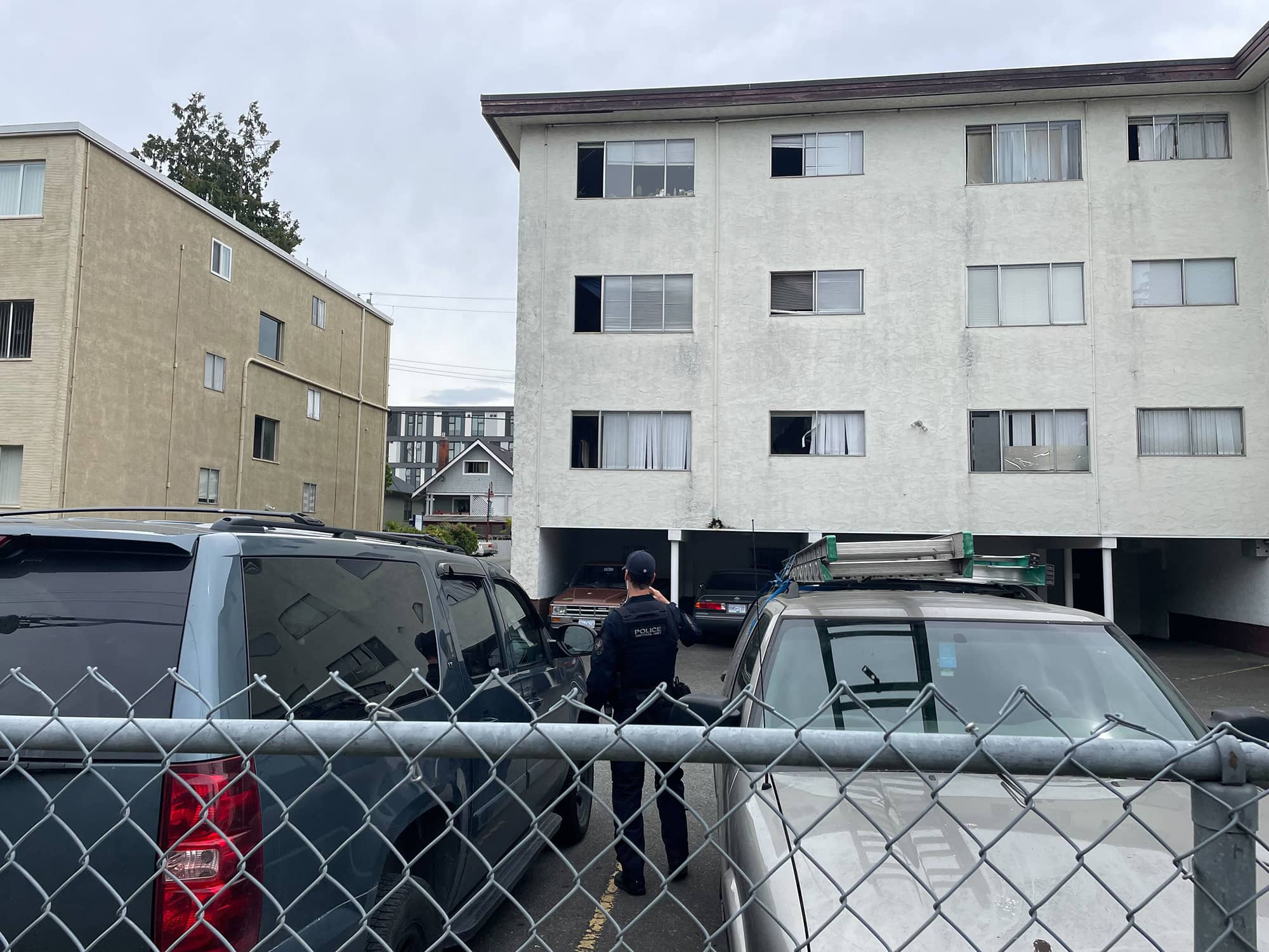 Police officers were back at the Quadra Village apartment building two days after the incident to follow up on their investigation. Photo: Brishti Basu / Capital Daily