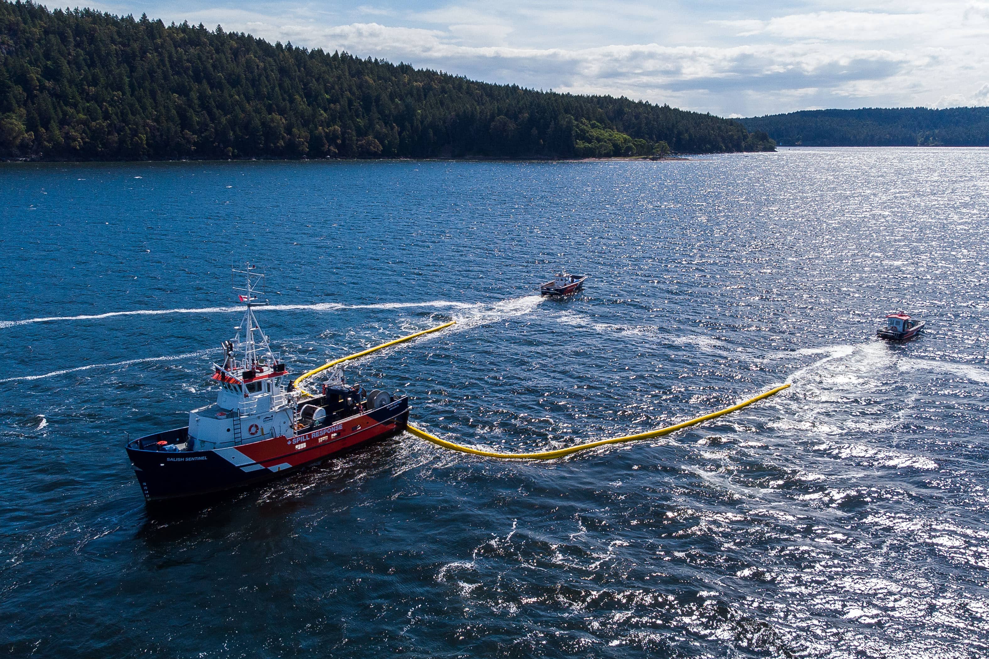 Western Canada Marine Response Corp crews practicing oil spill containment methods. Photo: James MacDonald / Capital Daily