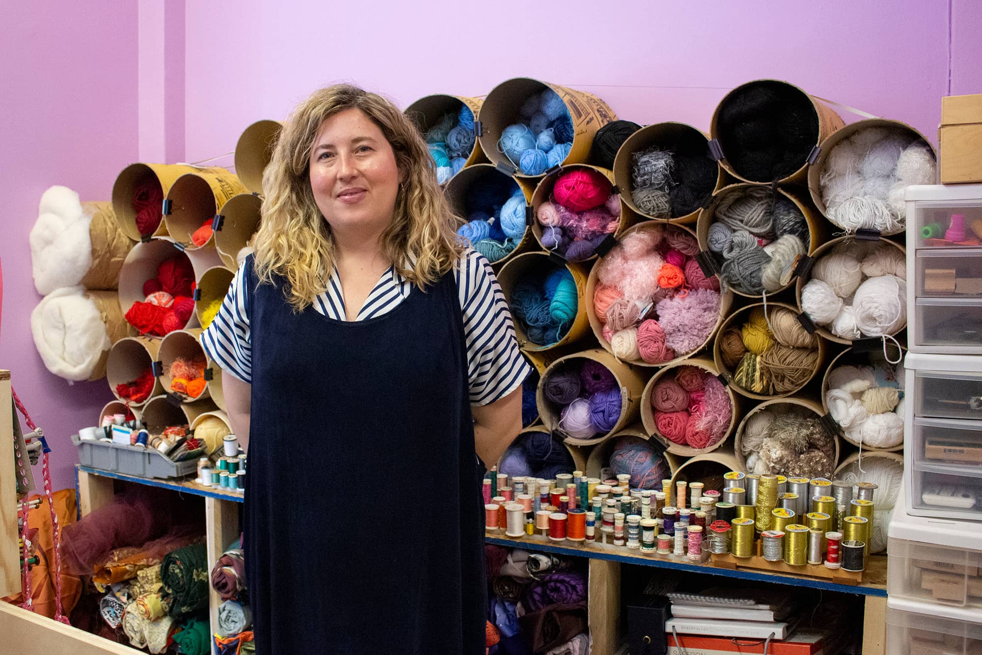 Ashley Howe, executive director of SUPPLY Victoria, has been setting up the new Creative Reuse Centre ahead of its opening on Saturday. Photo: Jolene Rudisuela / Capital Daily