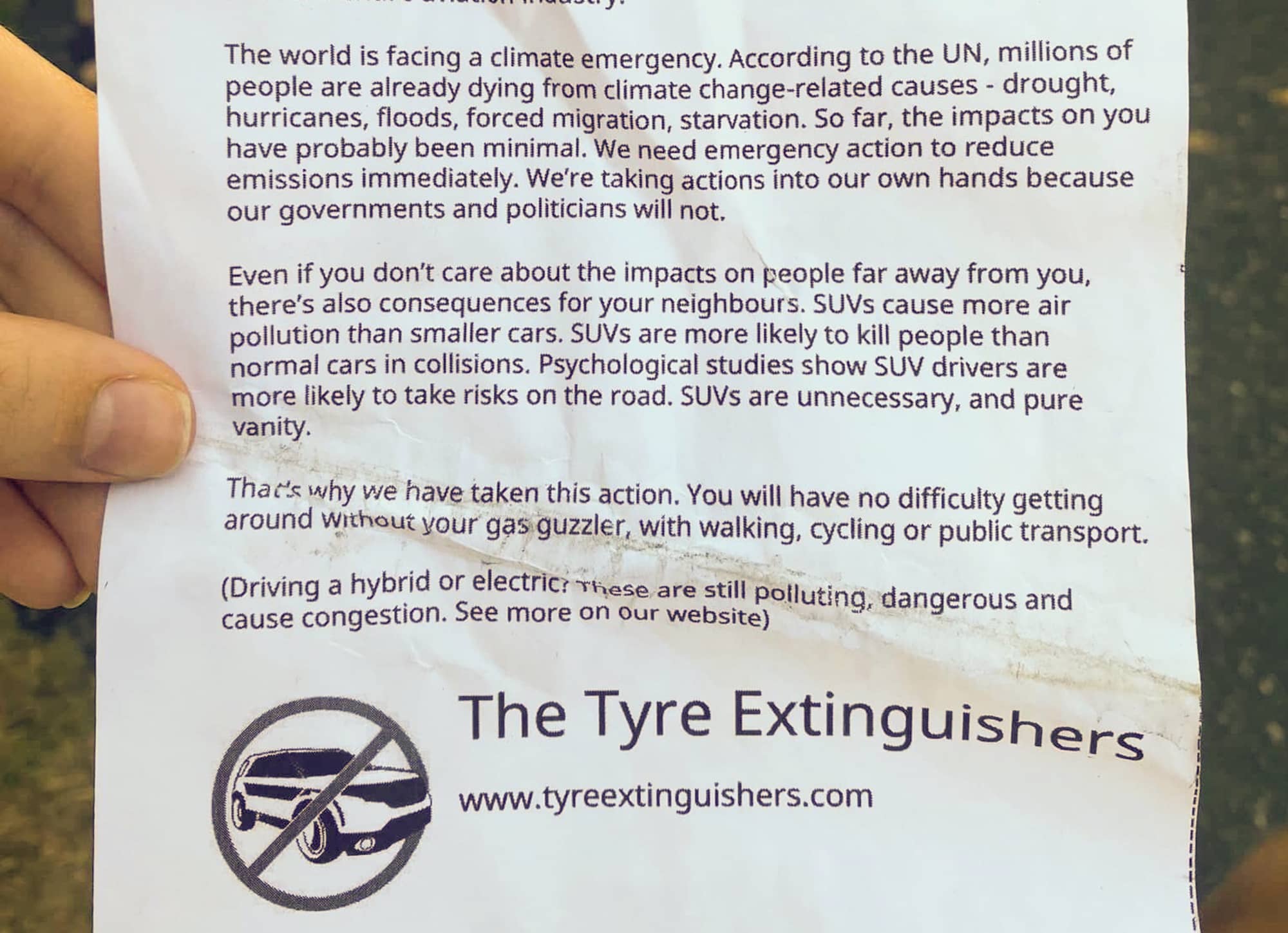 A note left on an SUV with deflated tires. Photo: Olivia Wein (Submitted)