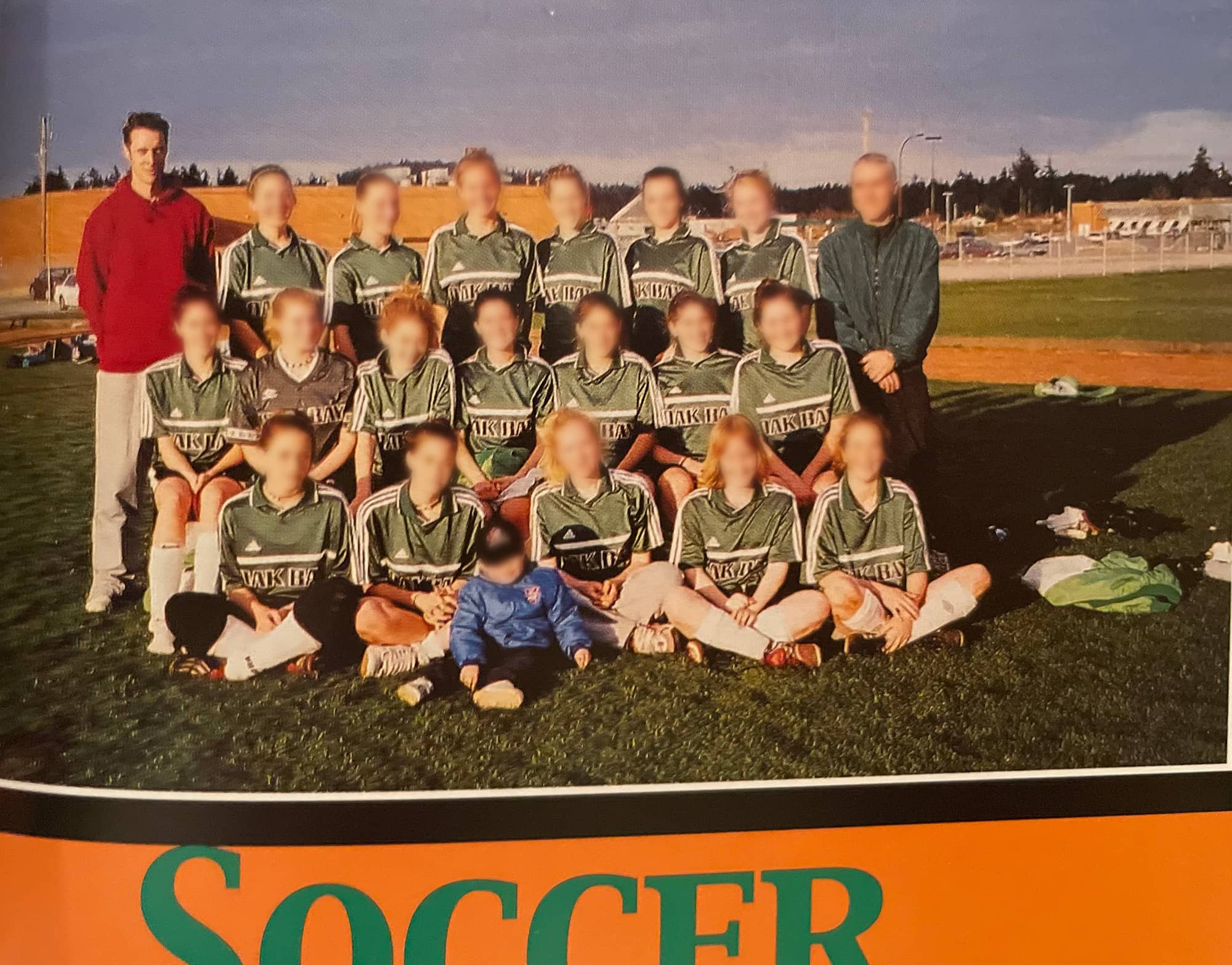 Brent Garraway (rear left) with the Oak Bay High senior girls soccer team. Photo provided. Illustration: Jolene Rudisuela / Capital Daily