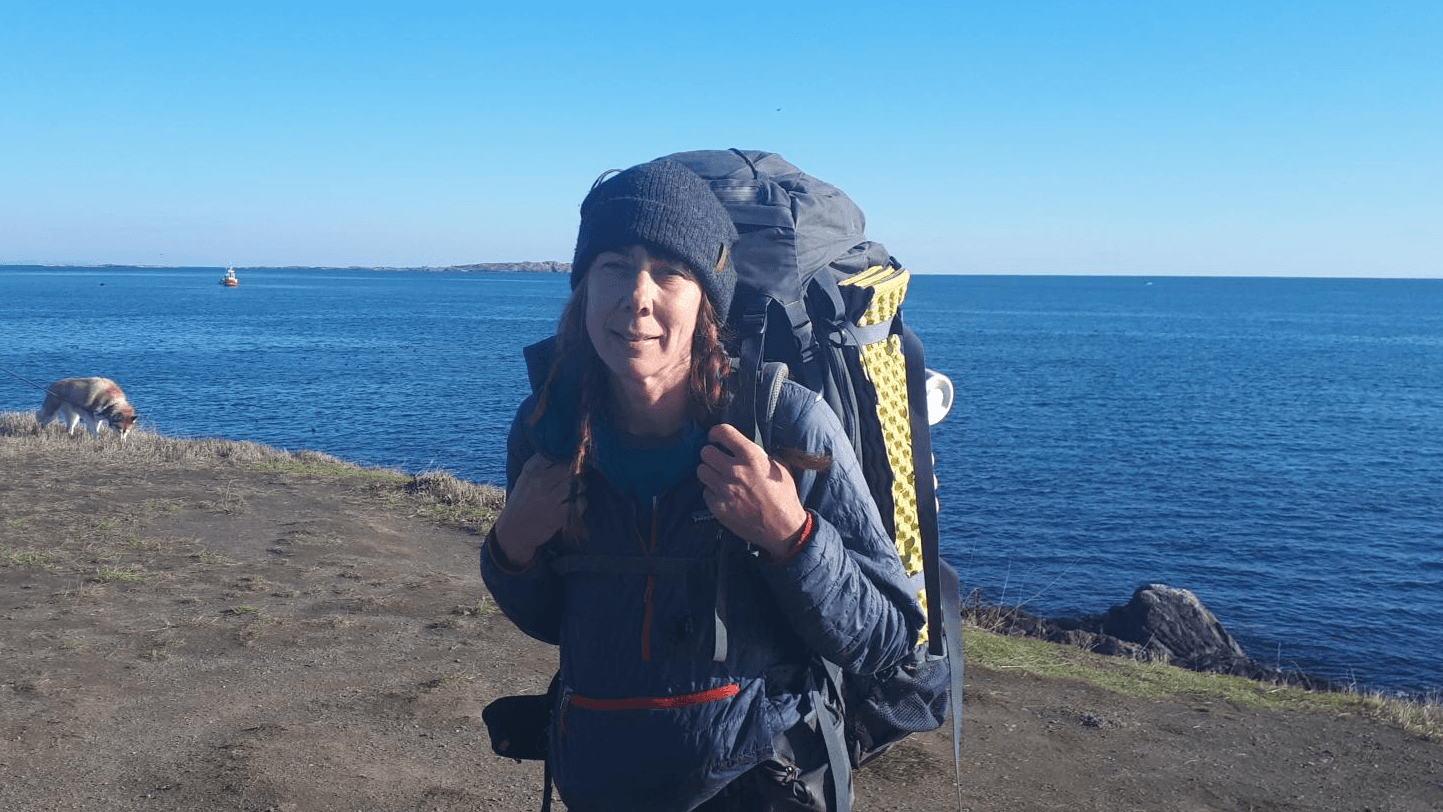 The Clover Point sun shines on Melanie Vogel after her 20,000km walk. Photo: Cam Welch / Capital Daily