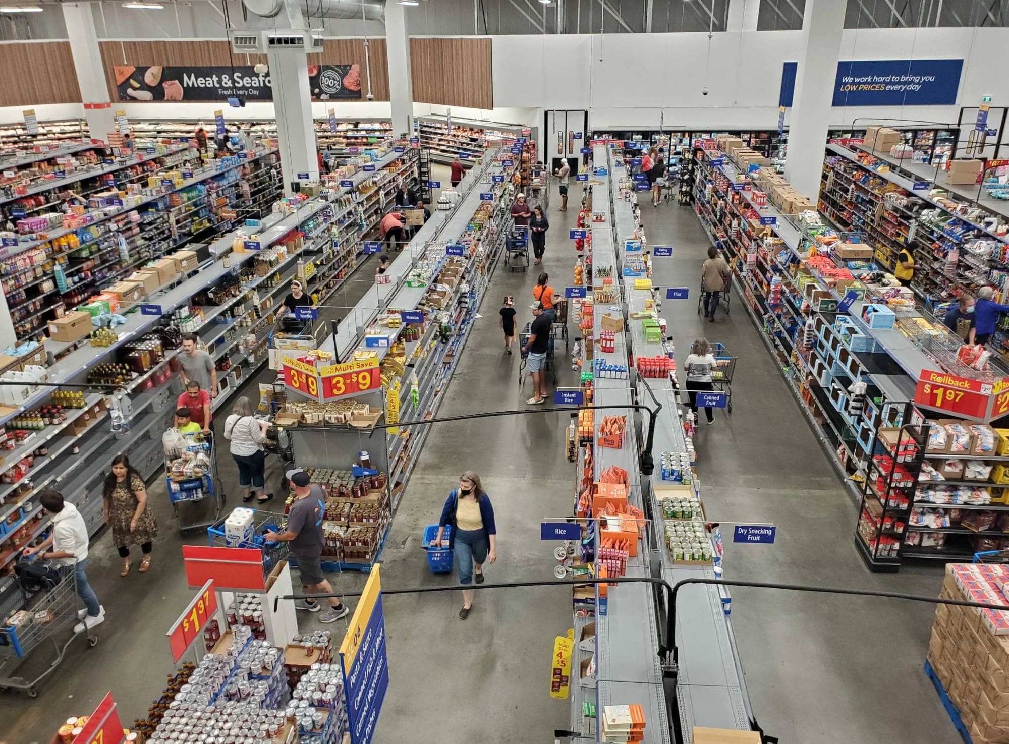 Shoppers browse the grocery aisles at Uptown Walmart in October. The cost of food for a family of four in Greater Victoria has increased by 25.7%, according to the latest living wage report by the Community Social Planning Council. Photo: Jolene Rudisuela / Capital Daily