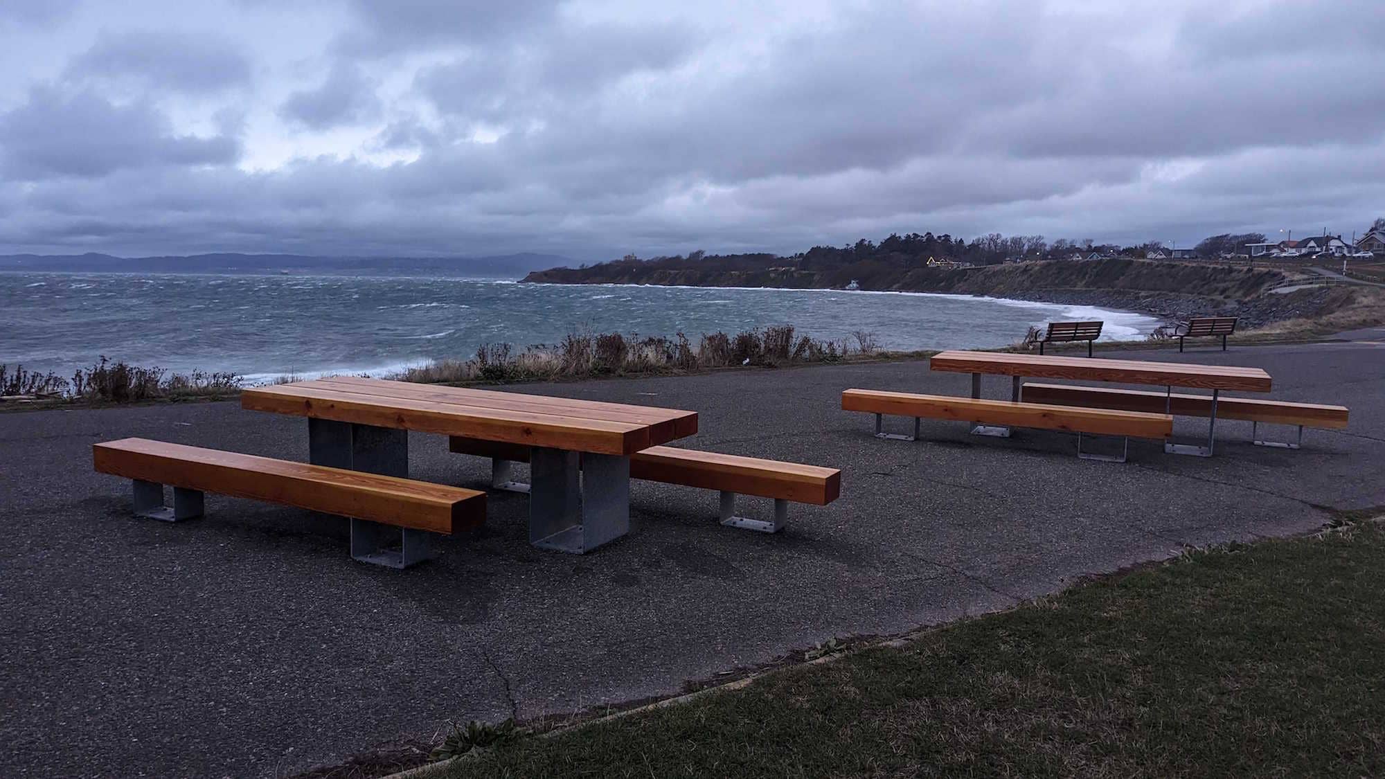 The City of Victoria's new picnic tables, pictured here at Clover Point but also located at Songhees Point and Topaz Park, were designed for accessibility, with added length and offset benches improving wheelchair access.