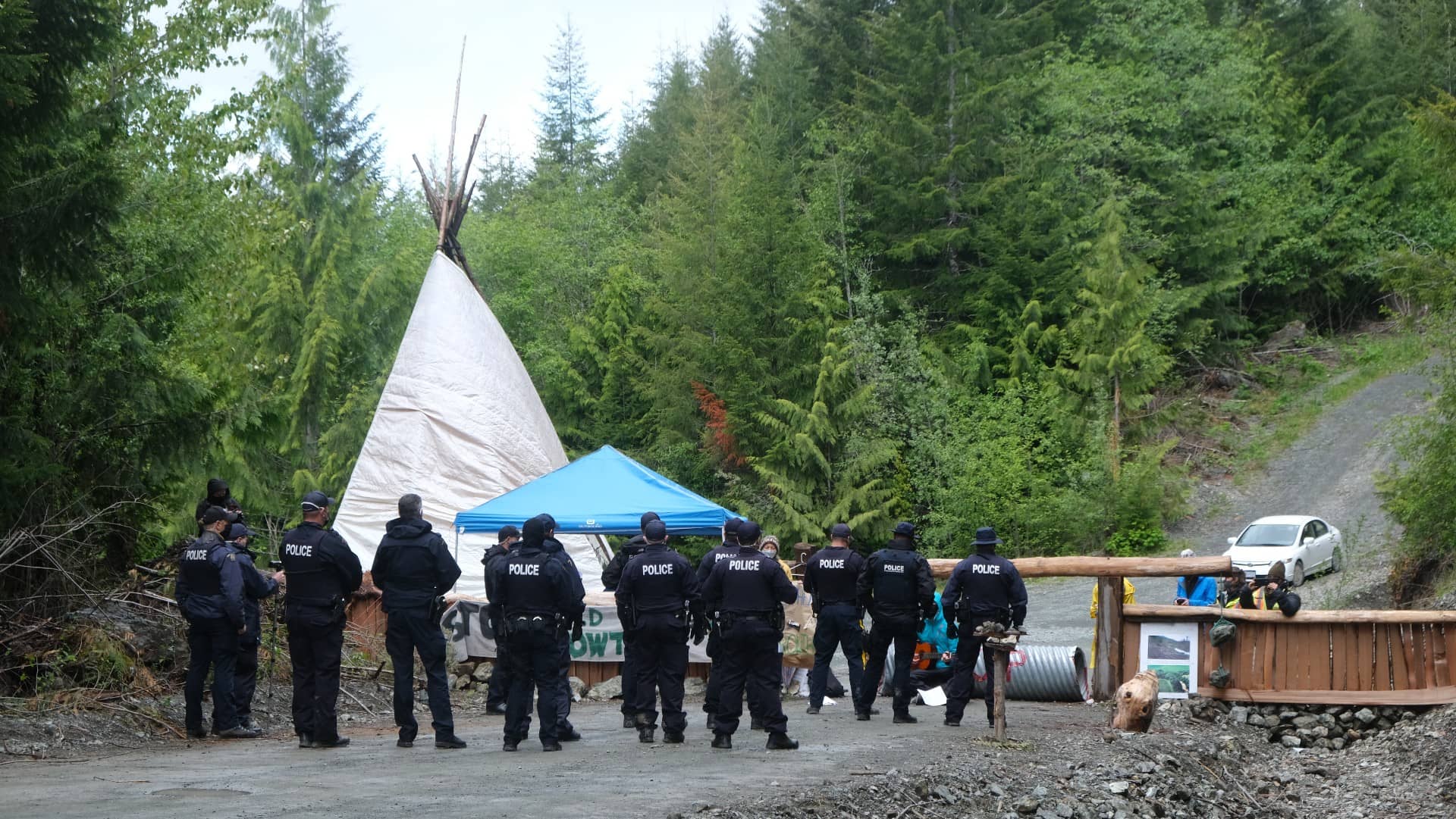 RCMP prepare to clear a blockade at Caycuse camp on May 17, 2021.