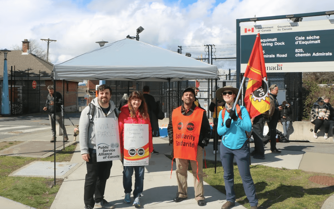 Striking workers at the Esquimalt Graving Docks Wednesday afternoon. Photo: Ryan Hook / Capital Daily