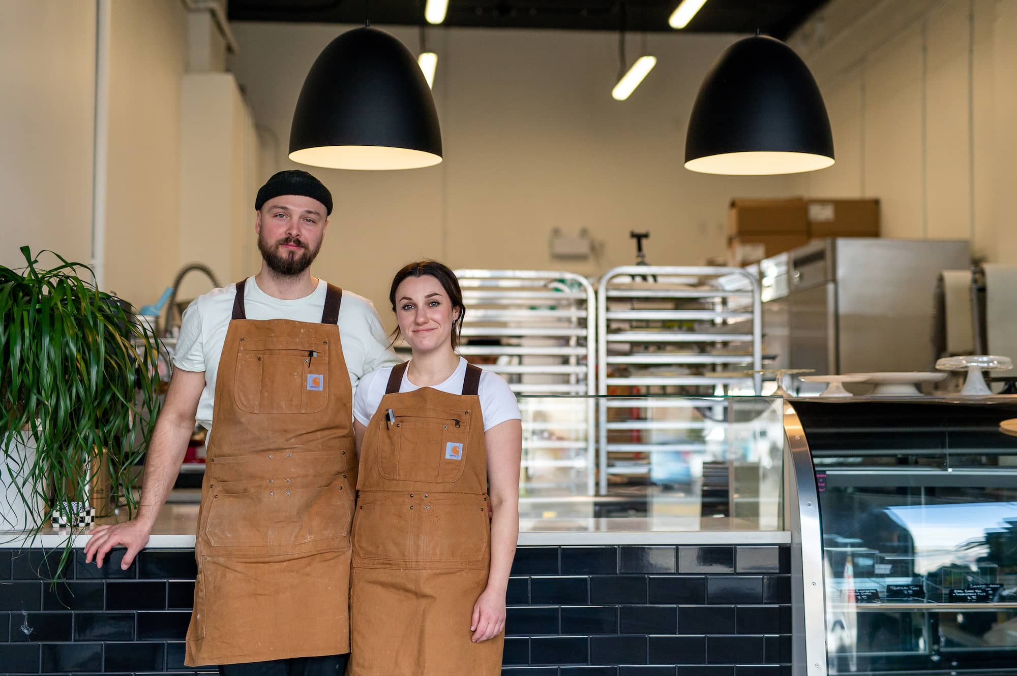 Curtis Helm (left) and Haley Landa (right) pose for a portrait in their most recent iteration of the Goodside Pastry House. Photo: James MacDonald / Capital Daily