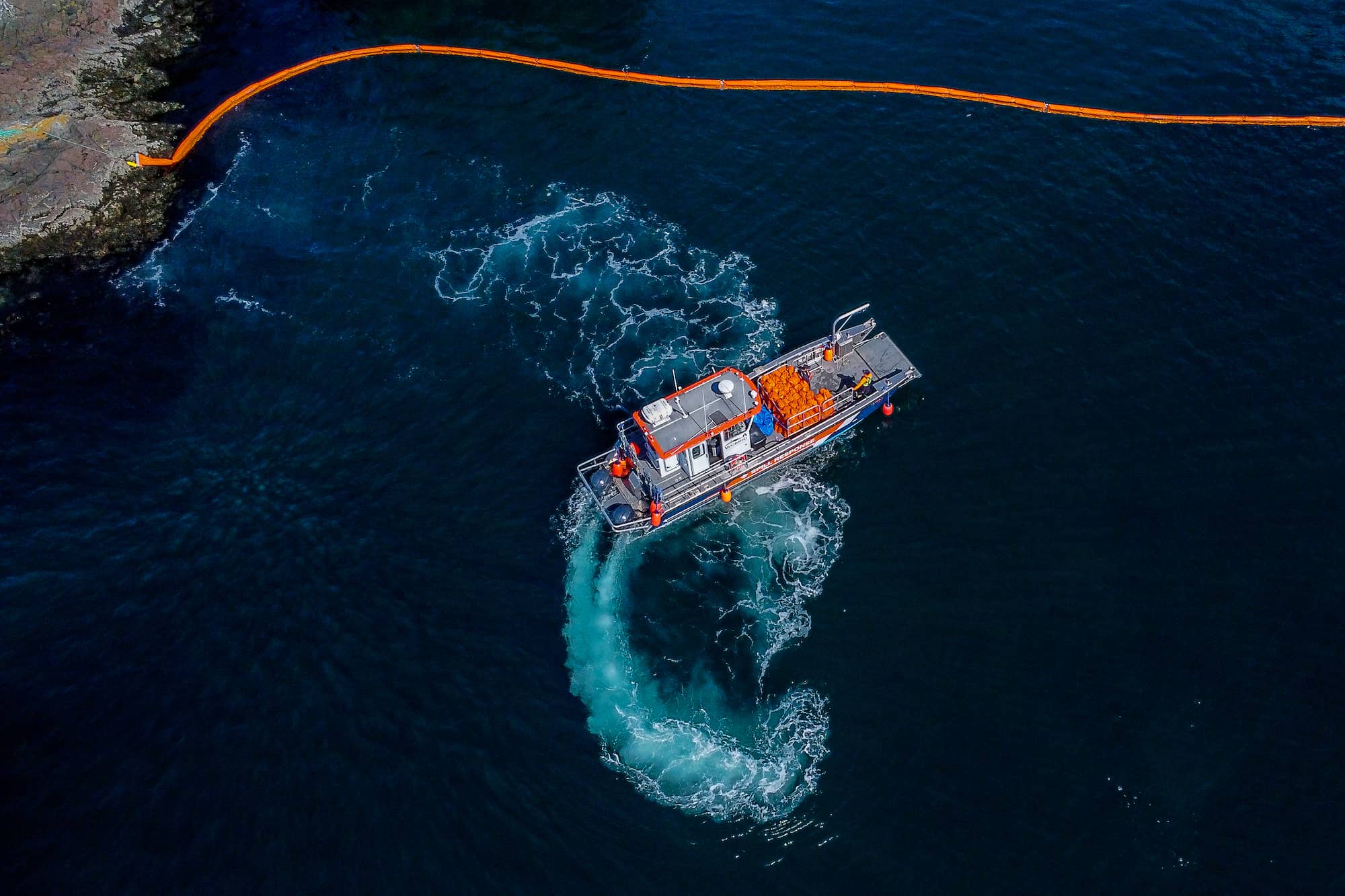 The Race Sentinel maneuvers around Spirit Bay on the South Island, as part of the Beecher Bay crew runs through a Geographic Response Strategies (GRS) verification and boom laying exercise. Photo: James MacDonald / Capital Daily