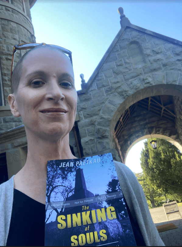 Jean Paetkau poses with her book outside Craigdarroch Castle. Photo: Jean Paetkau