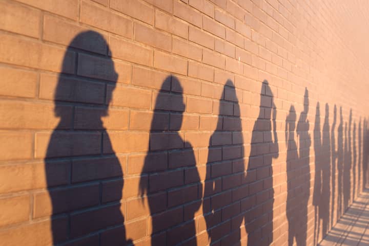 Silhouetted people. Photo: Shutterstock