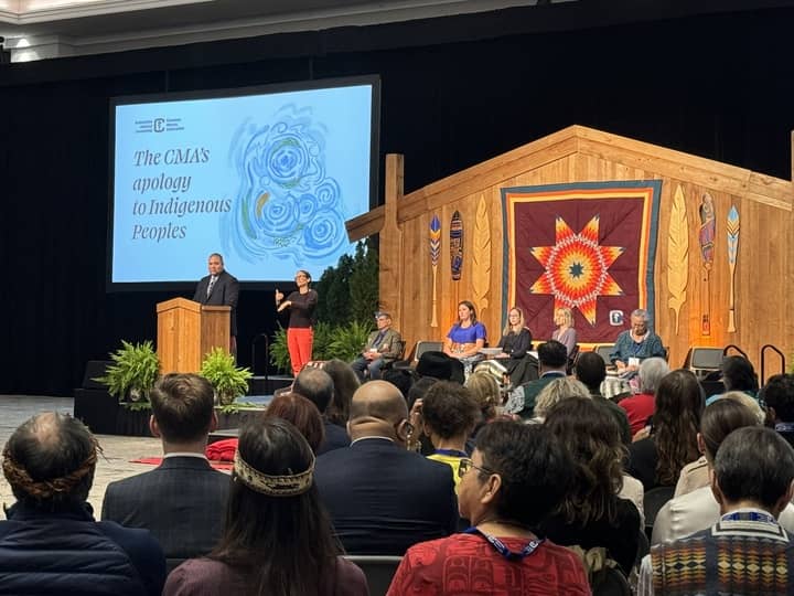 Dr. Alika Lafontaine addresses delegates at the CMA's official apology to Indigenous Peoples. Photo: Sidney Coles / Capital Daily