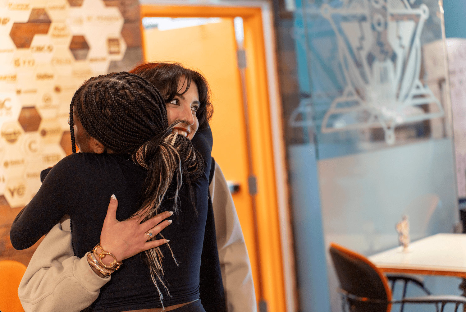 Olivia Hahn receiving a hug from a peer at the Learning Through Loss Society. Photo: Submitted