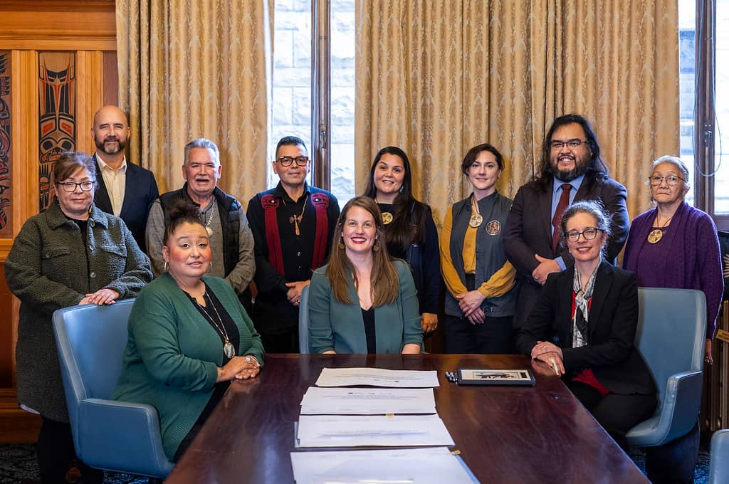 Signatories of the statement—called ‘Moving Forward and Speaking the Truth and Peace of Mind at Last’—gather for a photo. Photo: Province of BC