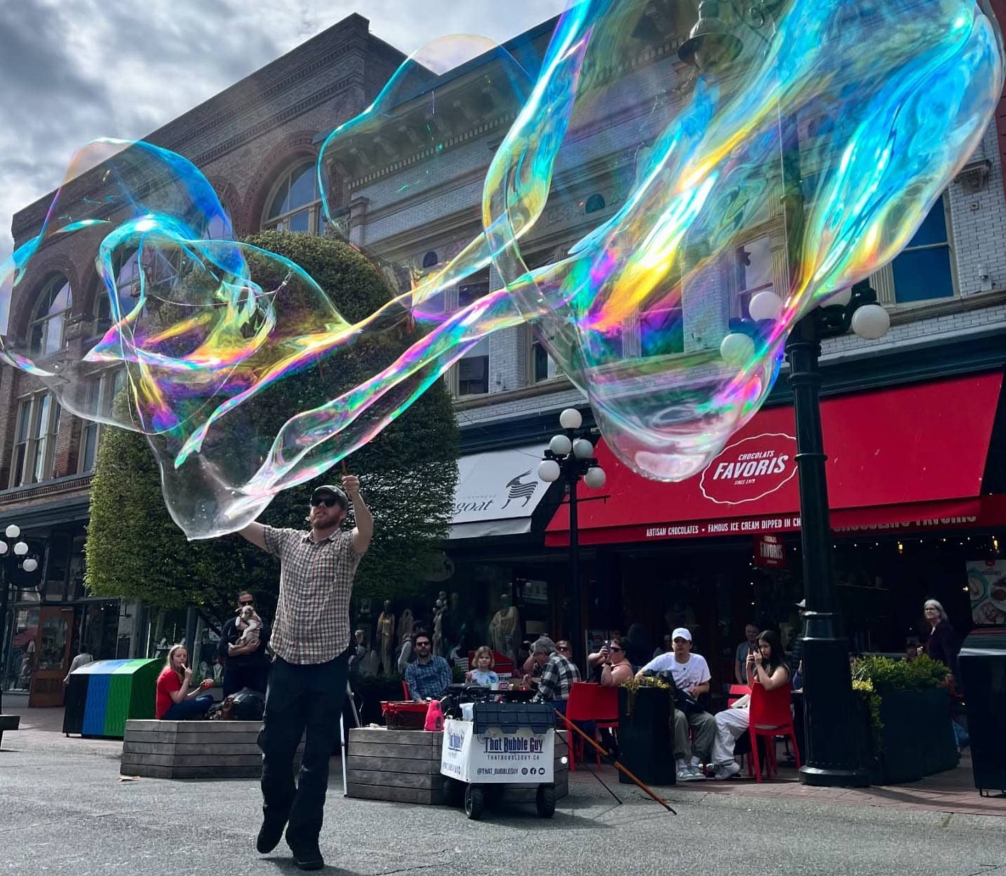 Dave Wilson shows off his bubble magic in downtown Victoria. Photo: That Bubble Guy / Facebook