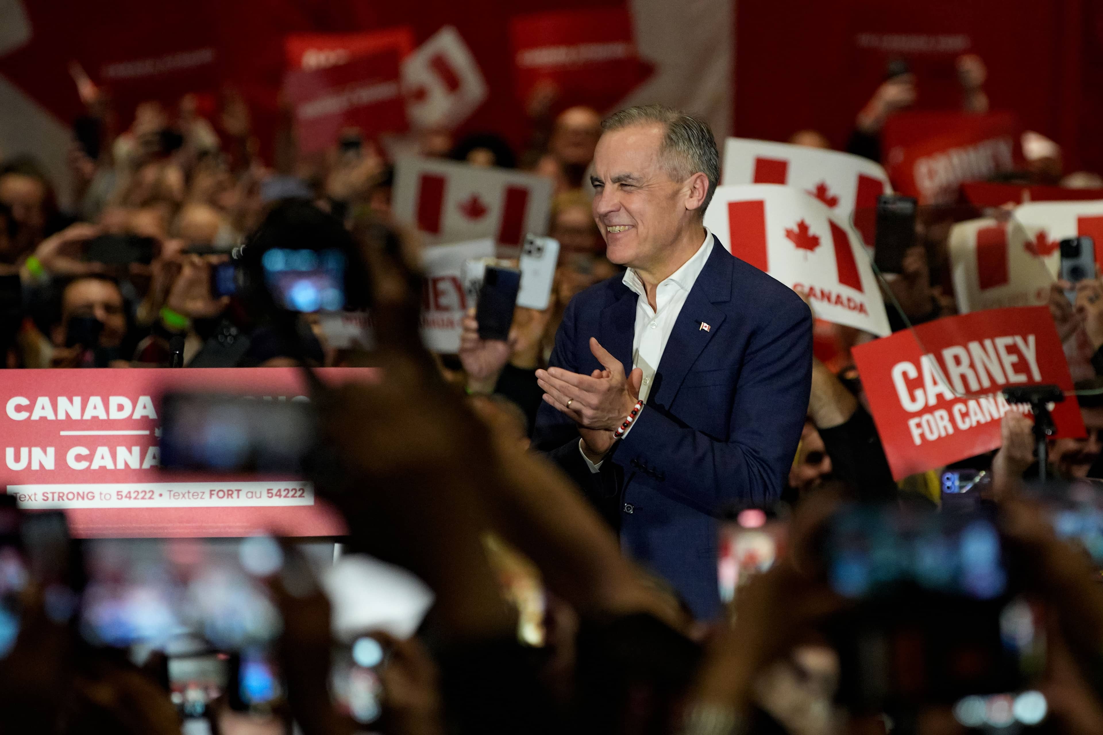 Liberal Party Leader Mark Carney engages the crowd in Ottawa following Monday's vote. Photo: Shutterstock