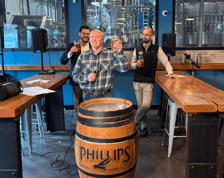 Jim Lister, president of Phillips Brewing & Malting Co., is flanked by Victoria MP Will Greaves and Thom Riley of the BC Craft Brewers Guild. Photo: Mark Brennae / Capital Daily