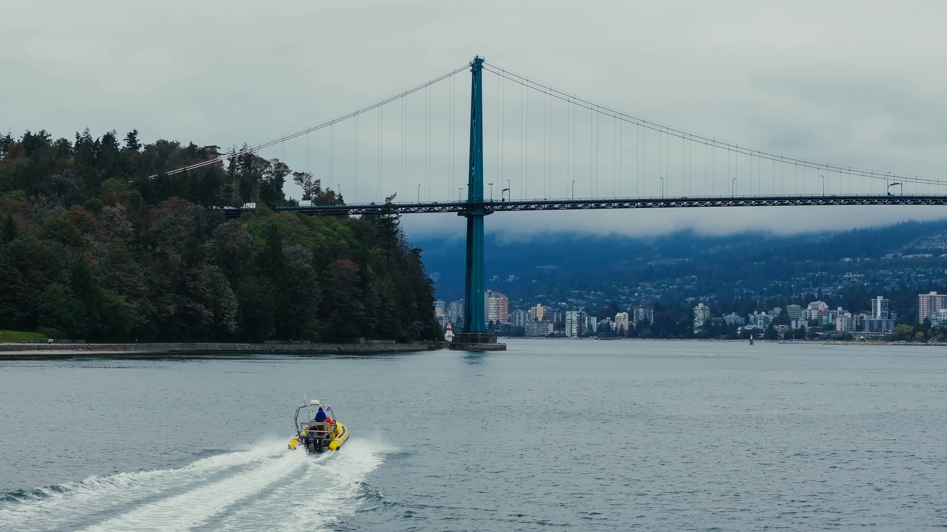 With Stanley Park to the left, a Sea Vancouver zodiac heads toward Vancouver's iconic Lions Gate Bridge. Photo: Sea Vancouver