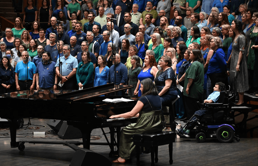 Victoria's The Choirs YYJ, under the direction of Marc Jenkins, performs at the Podium opener at UVic’s Farquhar Auditorium. Photo: Andy Rice